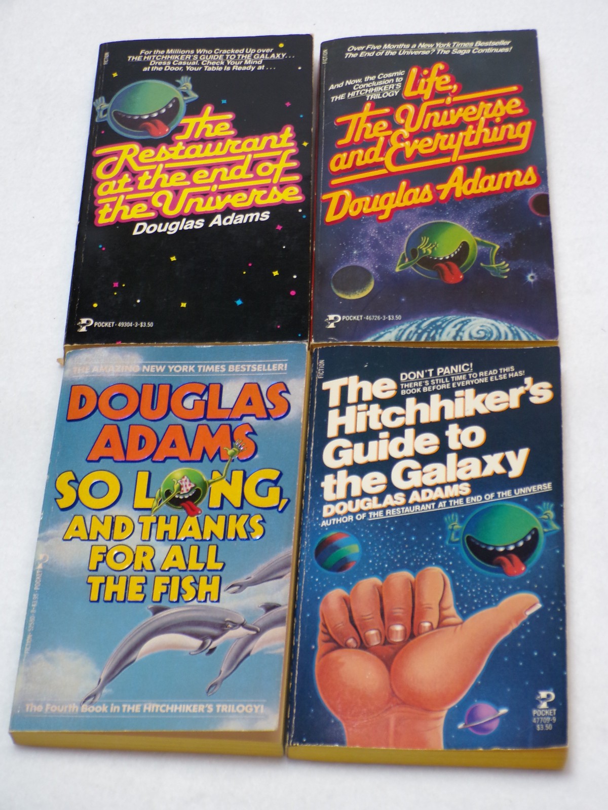 Lot of 4 Douglas Adams Paperback Books in Good Condition