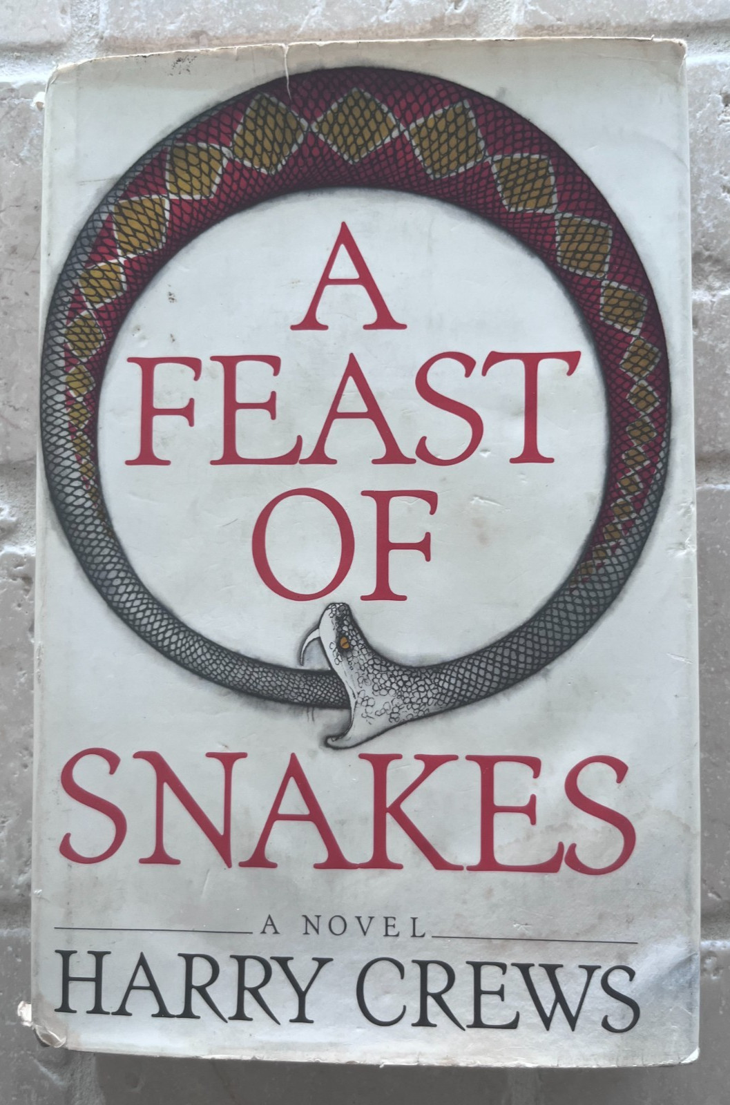 A Feast of Snakes, by Harry Crews. HC DJ FIRST Ed. Atheneum 1976